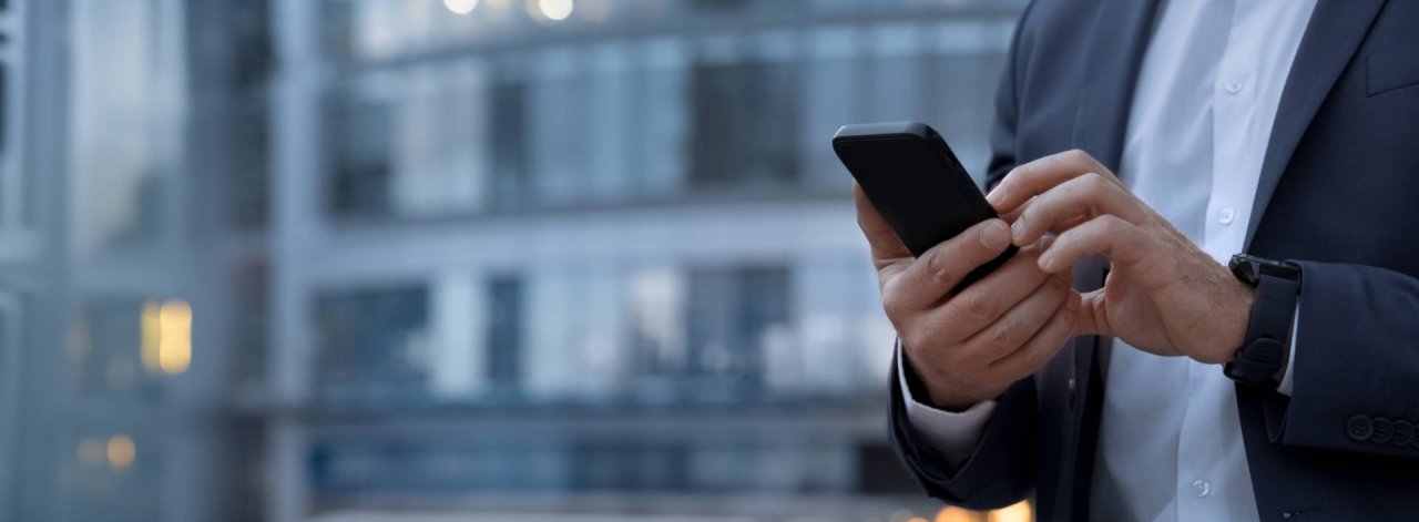 cell phone man holding notification.